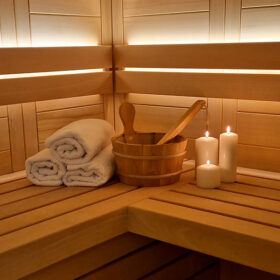 Private Finnish sauna with warm lighting at Lake Bohinj – romantic alpine retreat in Triglav National Park