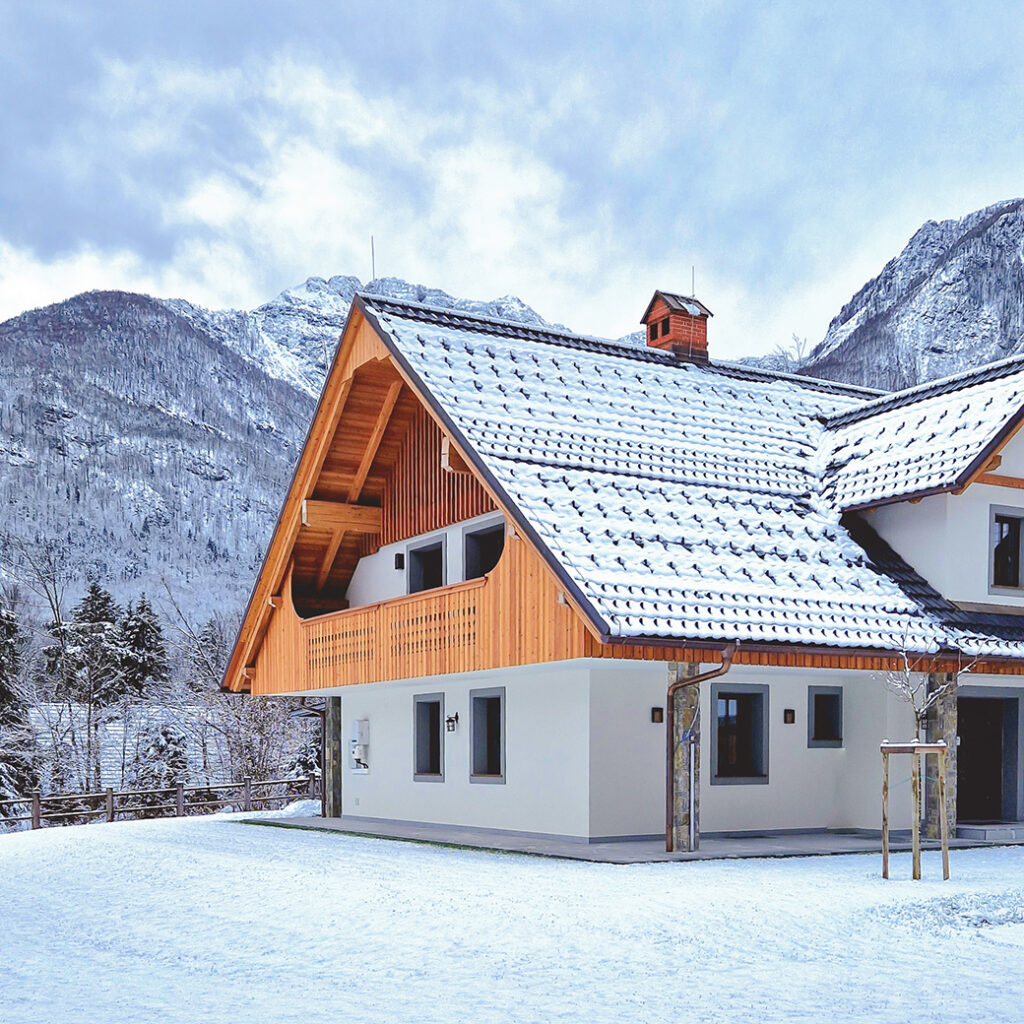 Privillage Stare Villa exterior in snow, alpine retreat near Lake Bohinj, Slovenia