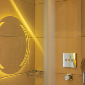 Rain shower experience in Alpine Spa Chalet by lake Bohinj.