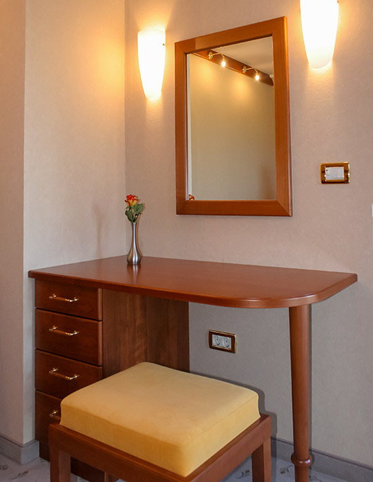 Elegant bedroom vanity with mirror in the Luxury Alpine Villa at Privillage Stare – B&B, Villa and Chalet Resort near Lake Bohinj in Triglav National Park.