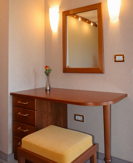 Elegant bedroom vanity with mirror in the Luxury Alpine Villa at Privillage Stare – B&B, Villa and Chalet Resort near Lake Bohinj in Triglav National Park.